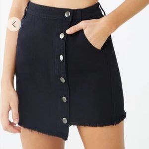 Asymmetrical black jean skirt